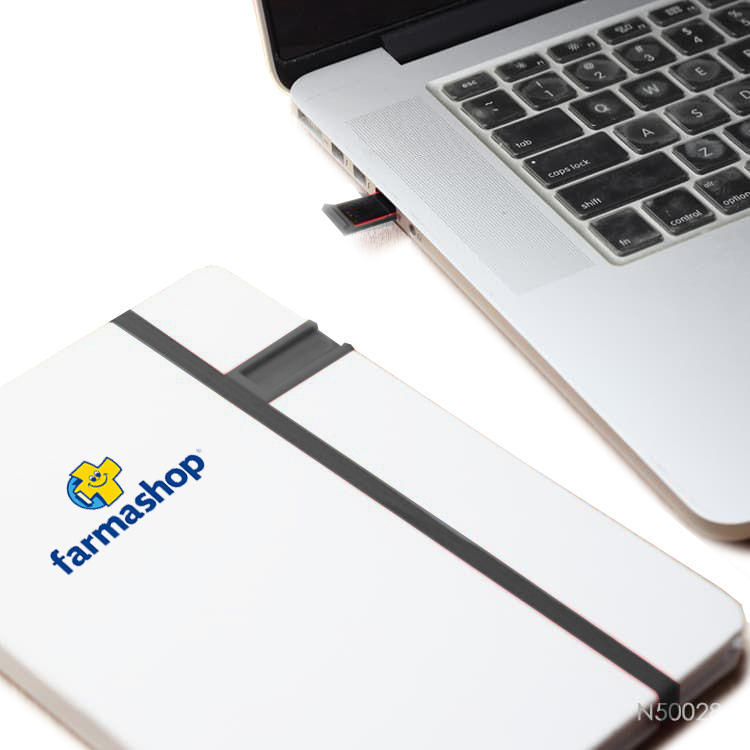 Cuaderno en PU con pendrive incluido. Se puede personalizar con un logotipo impreso en UV.