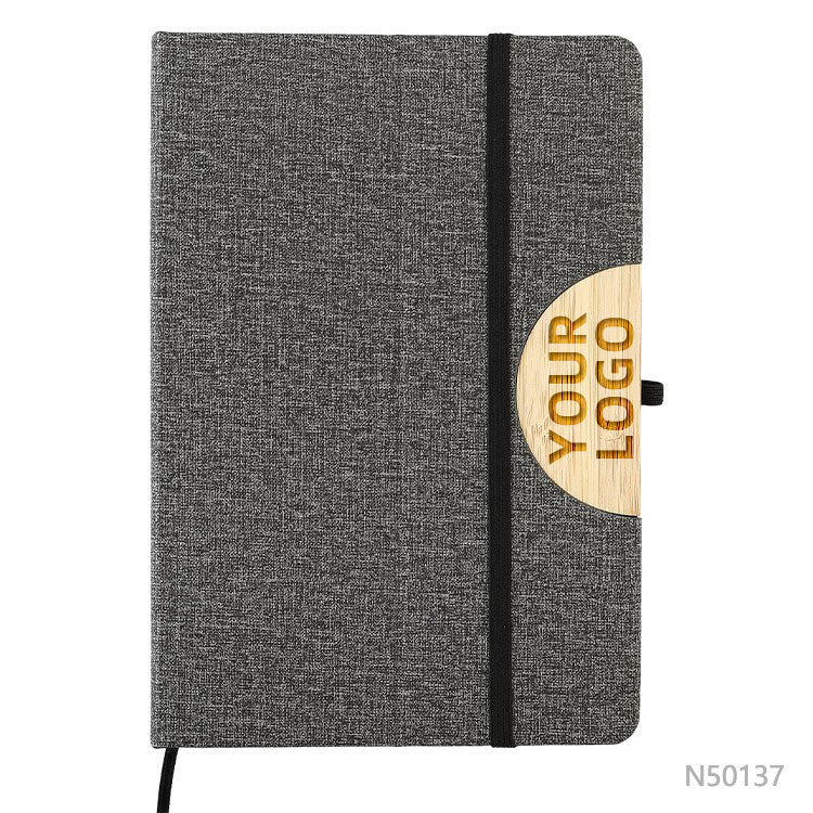 Cuaderno Lyon de tela y bambú con logo personalizado grabado en láser, regalo corporativo.